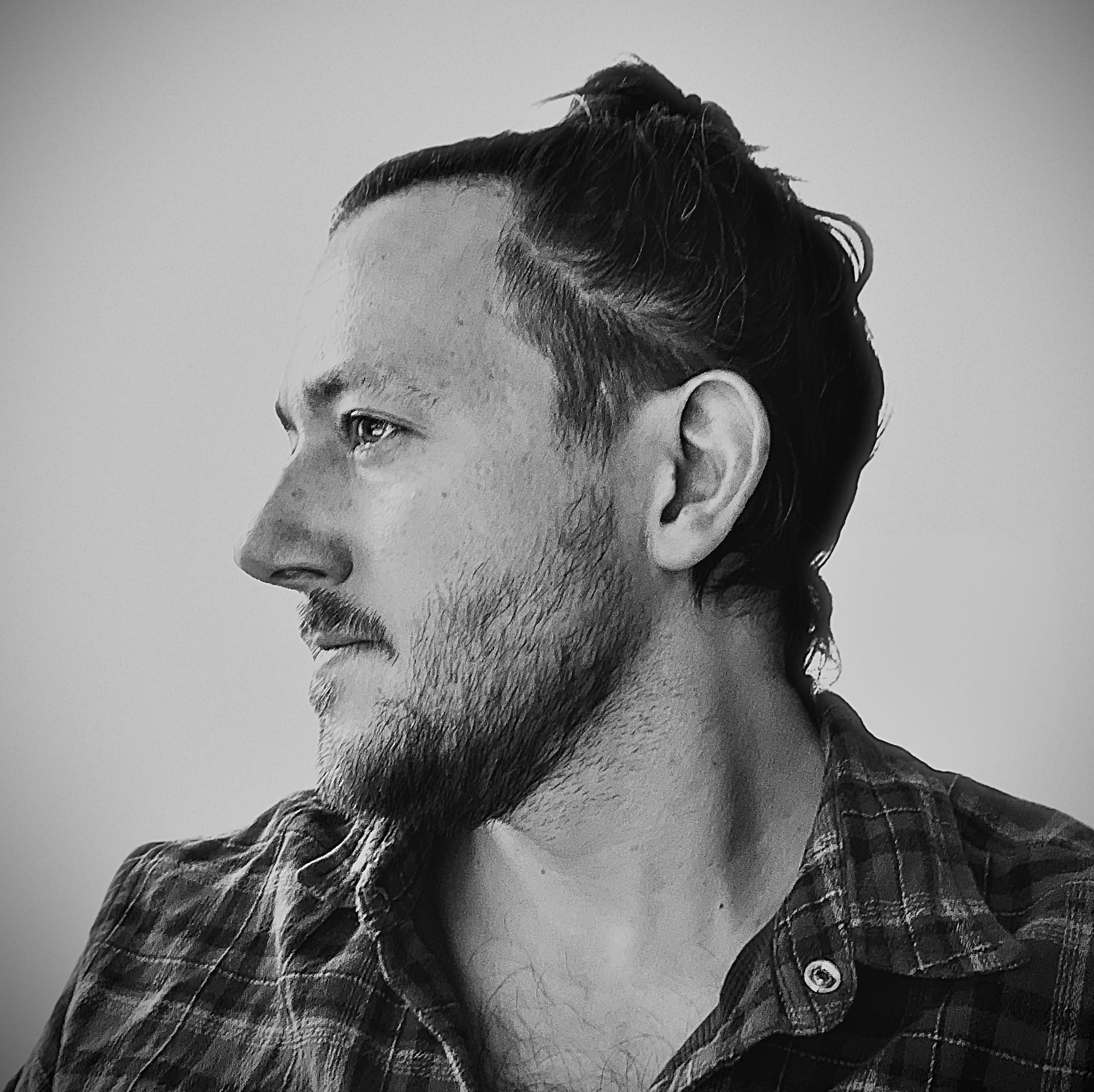 Thatcher Michelsen profile black and white photo of man